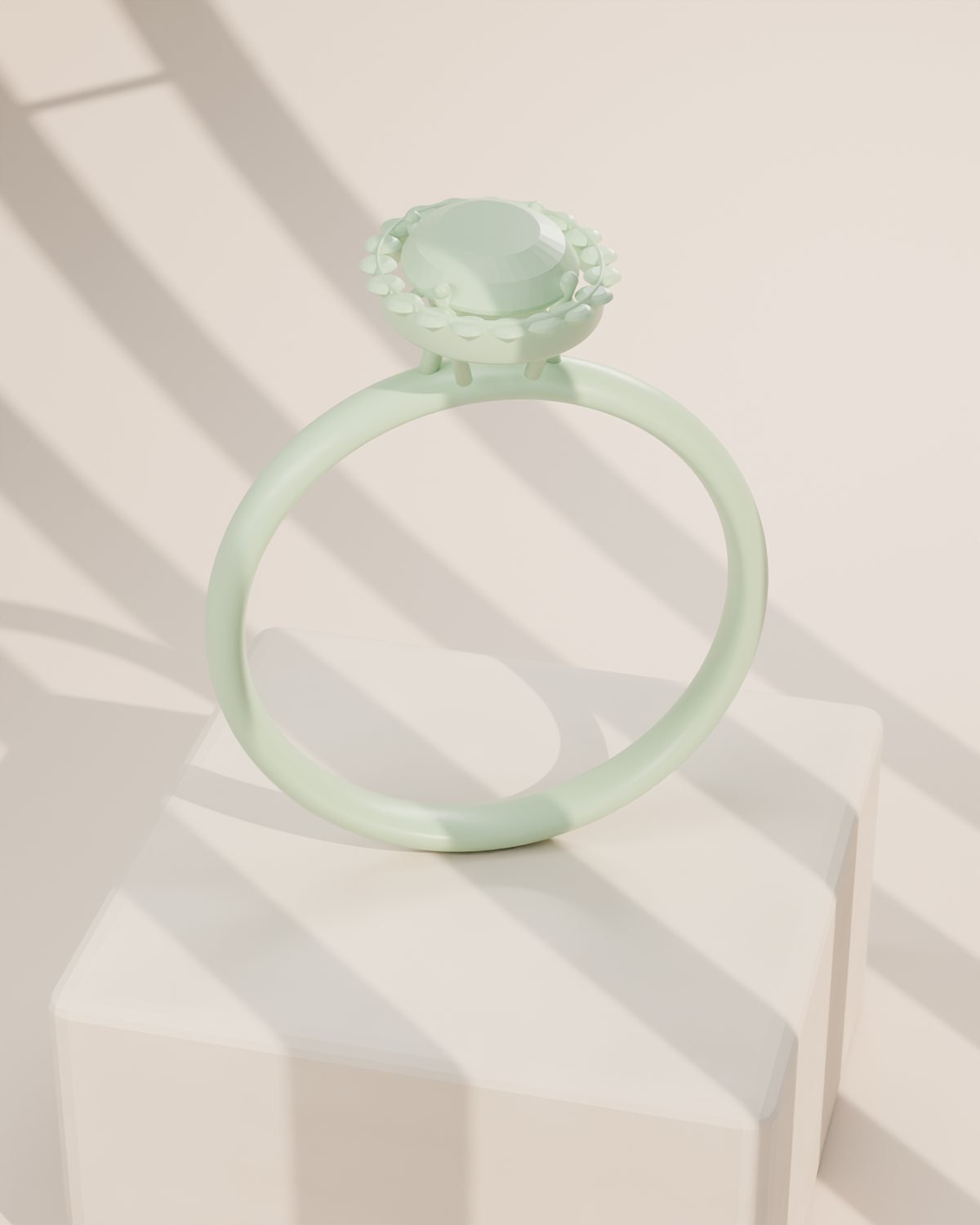 Modelo de anillo en cera junto a la pieza terminada