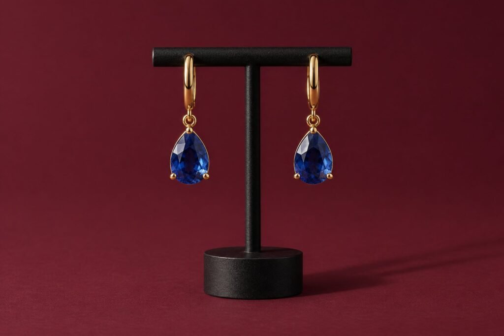 Aros de oro amarillo con zafiros talla pera
